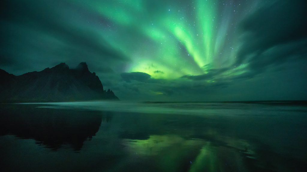 Aurora Borealis at Stokksnes beach in a cold night in autumn, Iceland