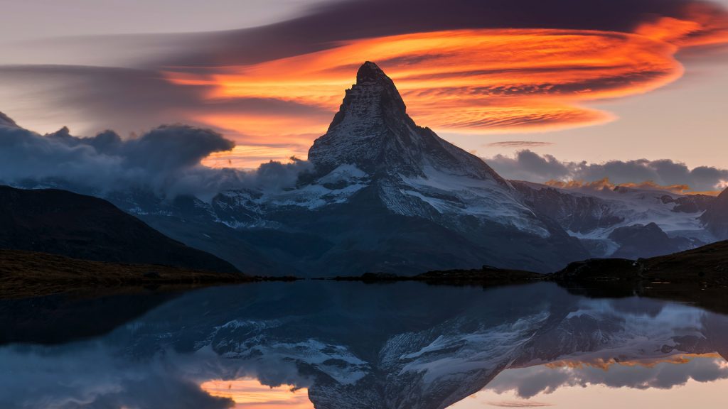 Matterhorn peak at sunset reflected in Stellisee Lake, Swiss Alps, Zermatt, Switzerland