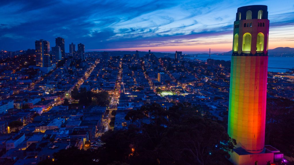 Coit Tower lights up with colors for San Francisco Pride celebrations, California, USA