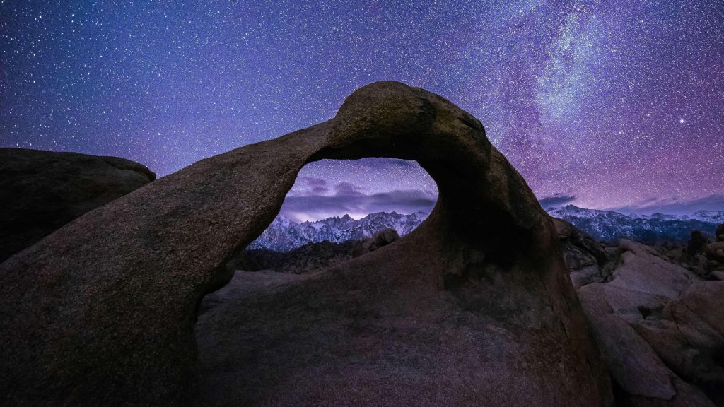 Mobius Arch at night with Milky Way, Alabama Hills range in Inyo County, California, USA