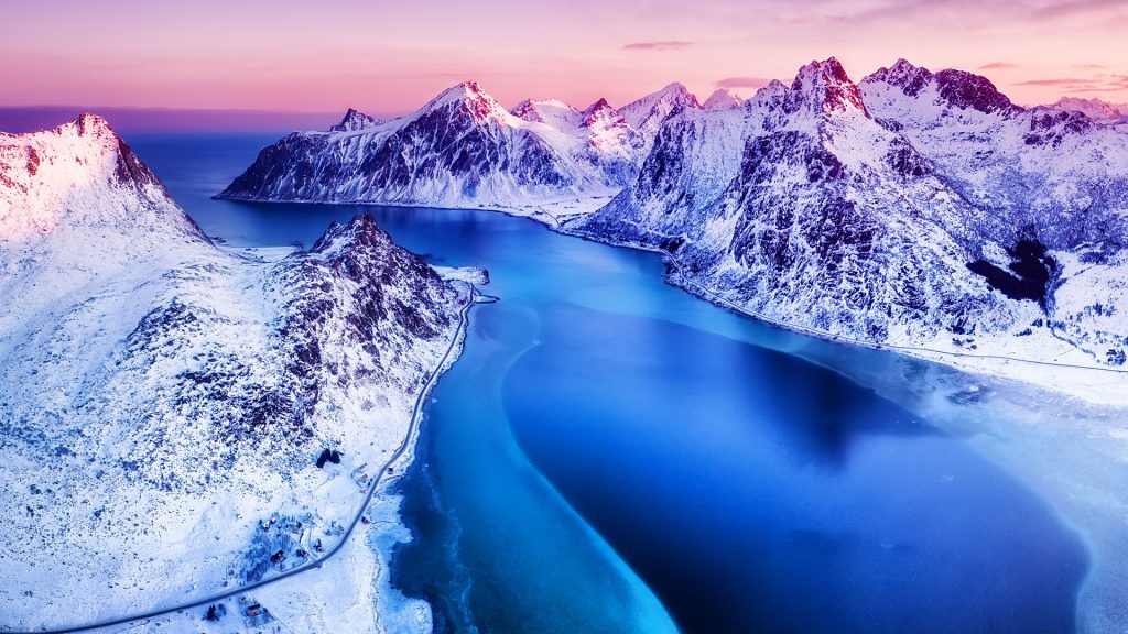 Aerial view of mountains and sea at sunset in winter time, Lofoten islands, Norway