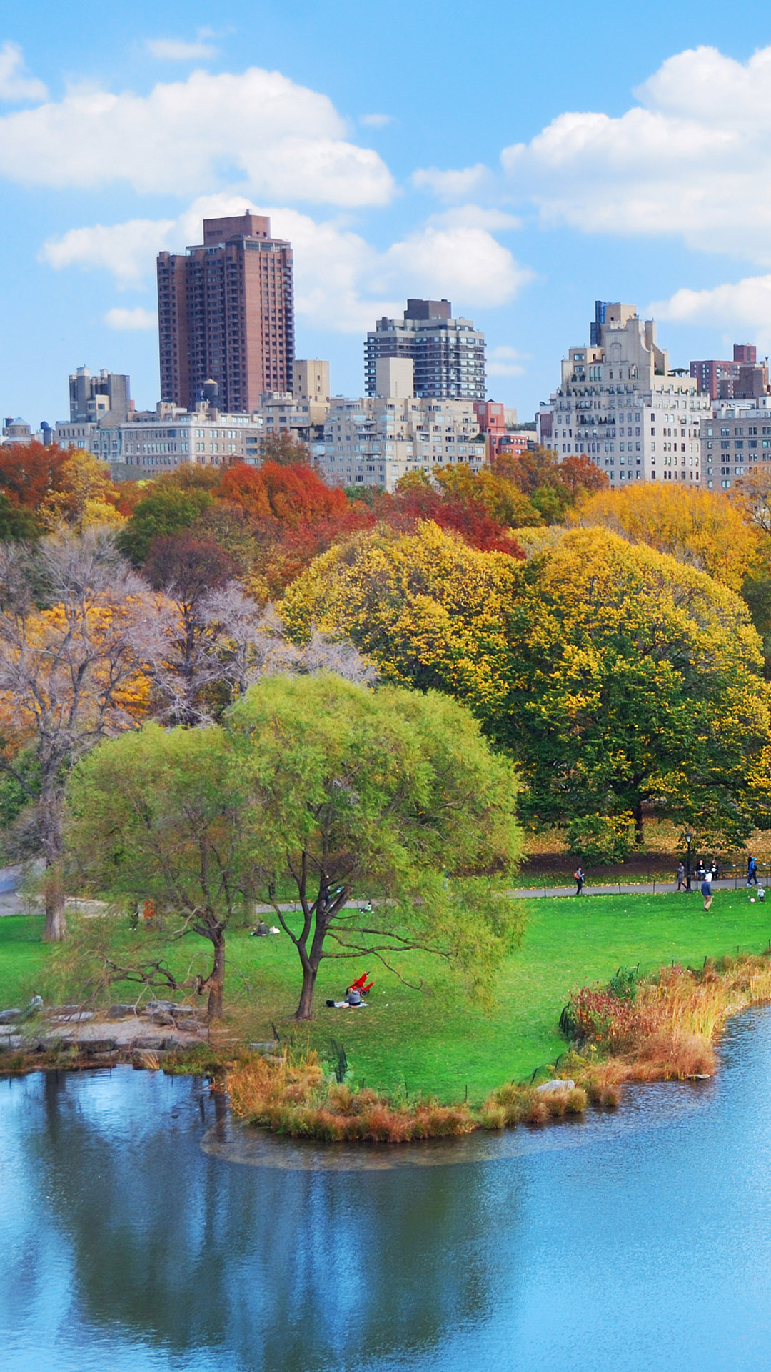 New York City Manhattan Central Park panorama in autumn, lake with ...