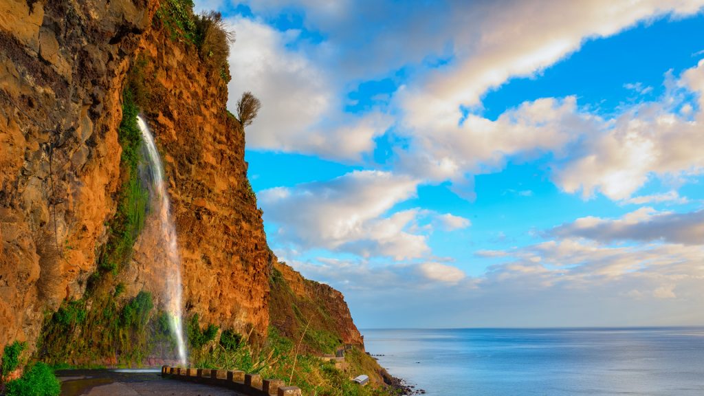 Waterfall on old closed road between Ponta do Sol and Jardim do Mar, Madeira island, Portugal