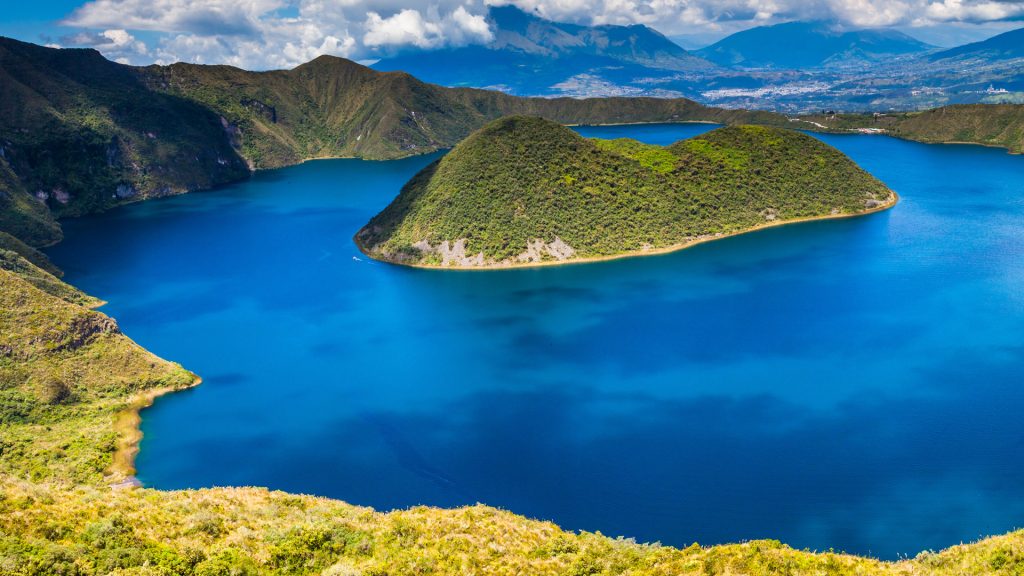 Panorama of Cuicocha blue lagoon inside the crater of Cotacachi volcano, Imbabura, Ecuador
