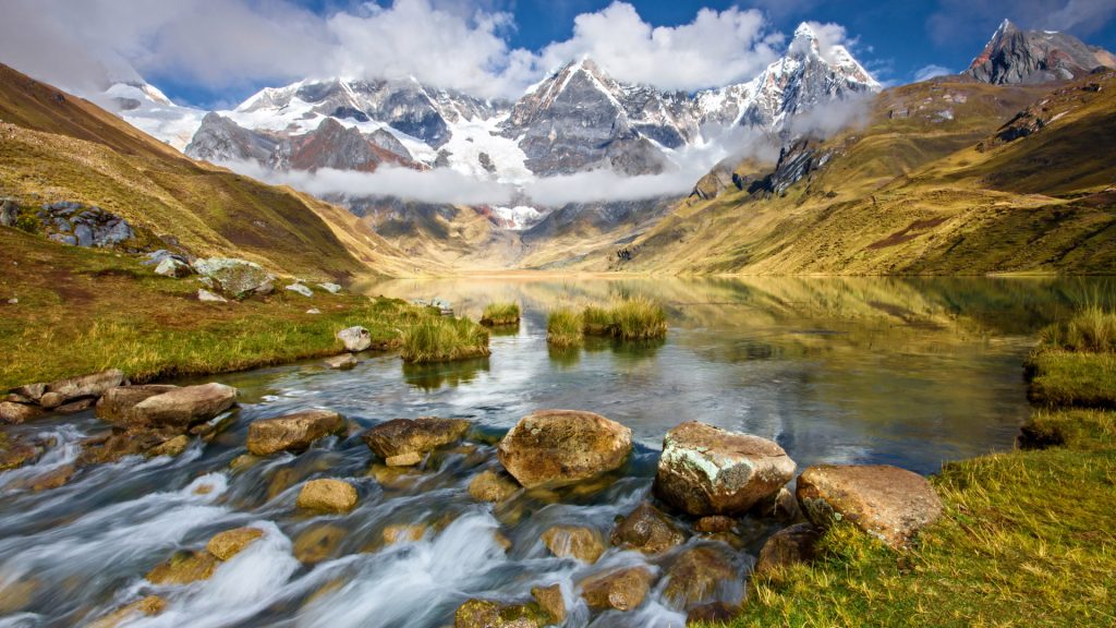 Cordillera Huayhuash landscape view with river and lake Carhuacocha, Andes of Peru