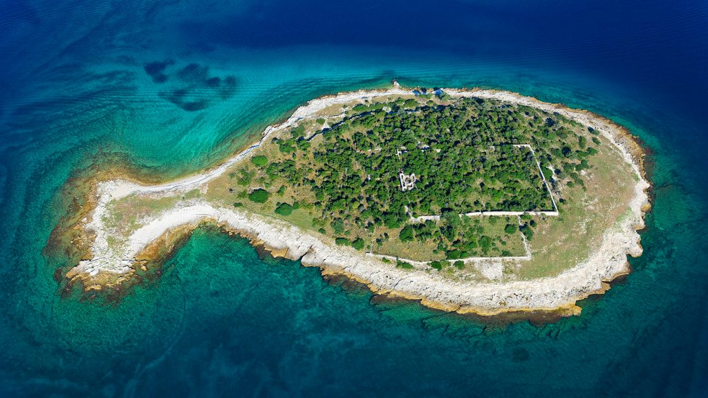 Overhead aerial view of fish shaped island Gaz in Brijuni islands, Istria, Croatia