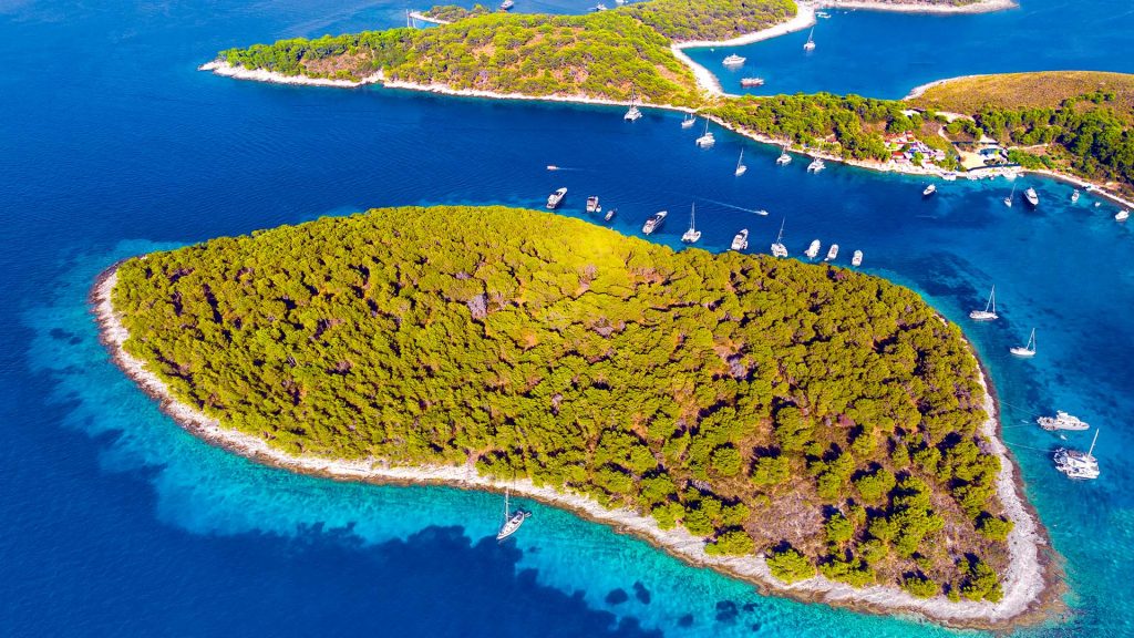 Glimpse of the island of Marinkovac/Planikovac in the Pakleni archipelago, Dalmatia, Croatia