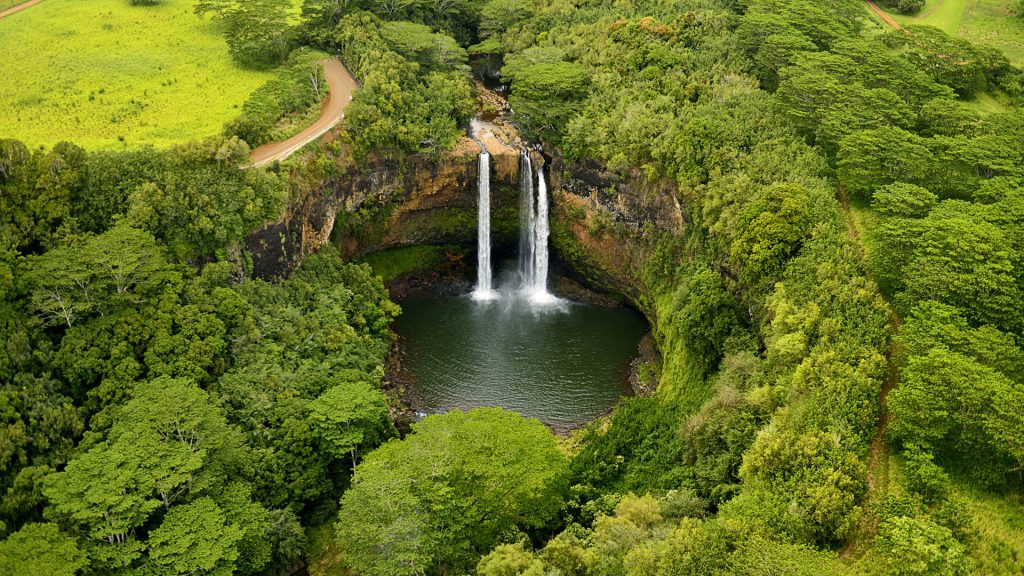 Aerial view across Wailua Falls, Kauai island, Hawaii, USA