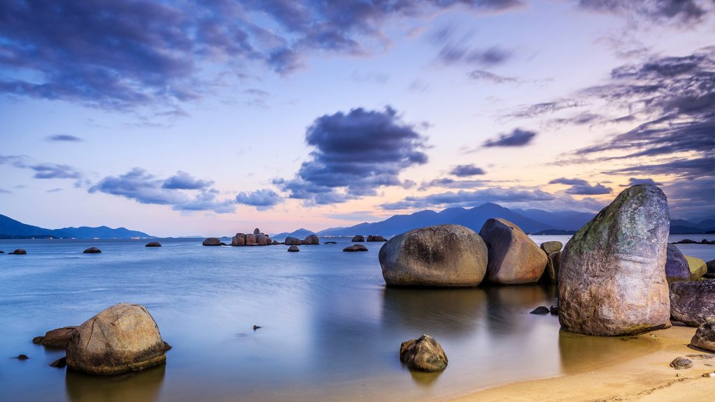 Granite boulders and clouds, Itaguacu, Santa Catarina Island, Florianópolis, Brazil