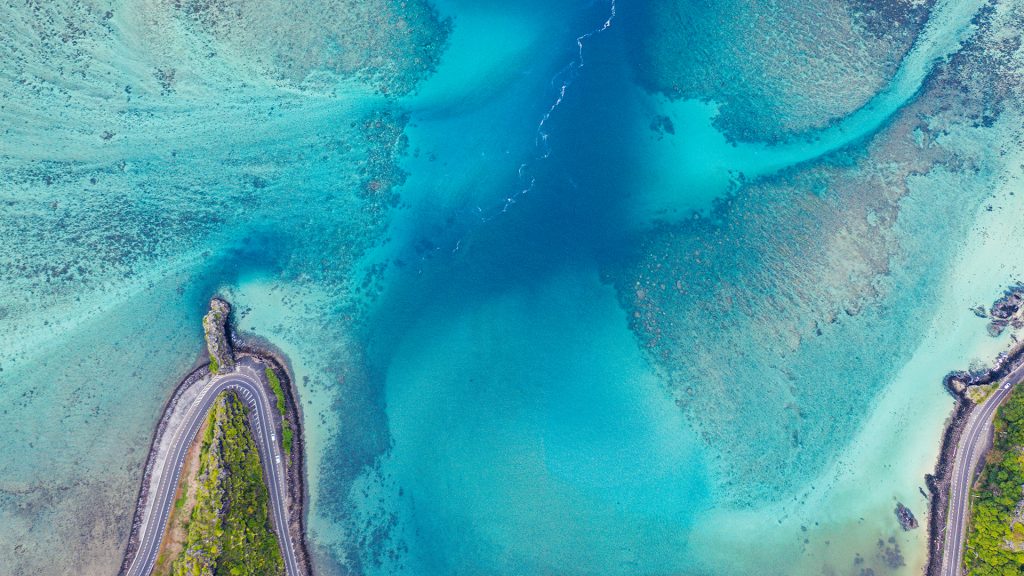 Maconde Viewpoint and coastal road by tuquoise sea lagoon, Baie Du Cap, Mauritius