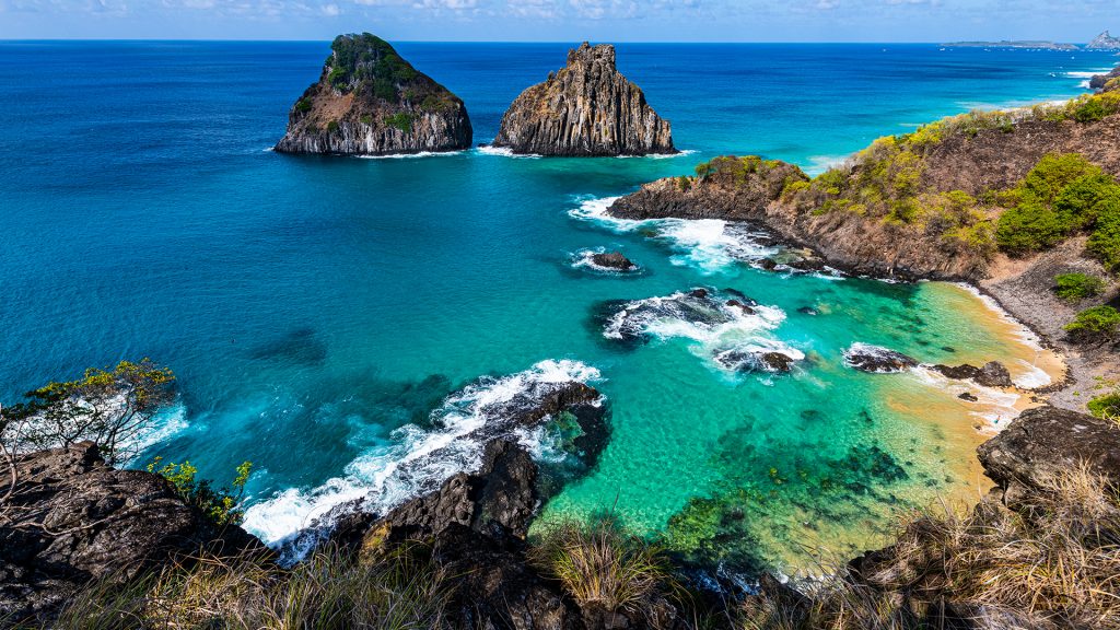 Turquoise water around the Two Brothers rocks, Fernando de Noronha archipelago, Brazil