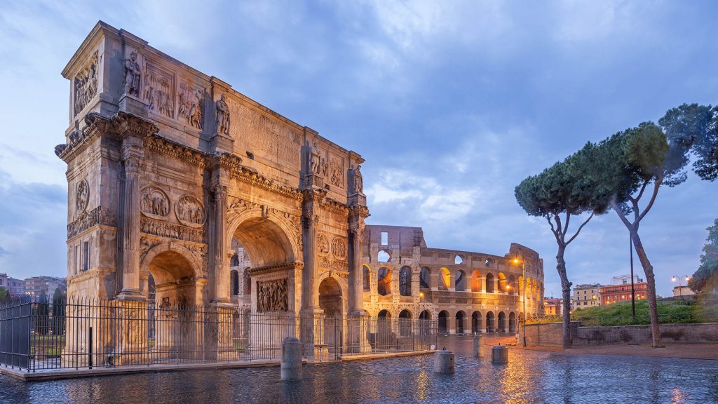 Arch of Constantine and Colosseum in the evening, Seven Hills of Rome, Lazio, Italy