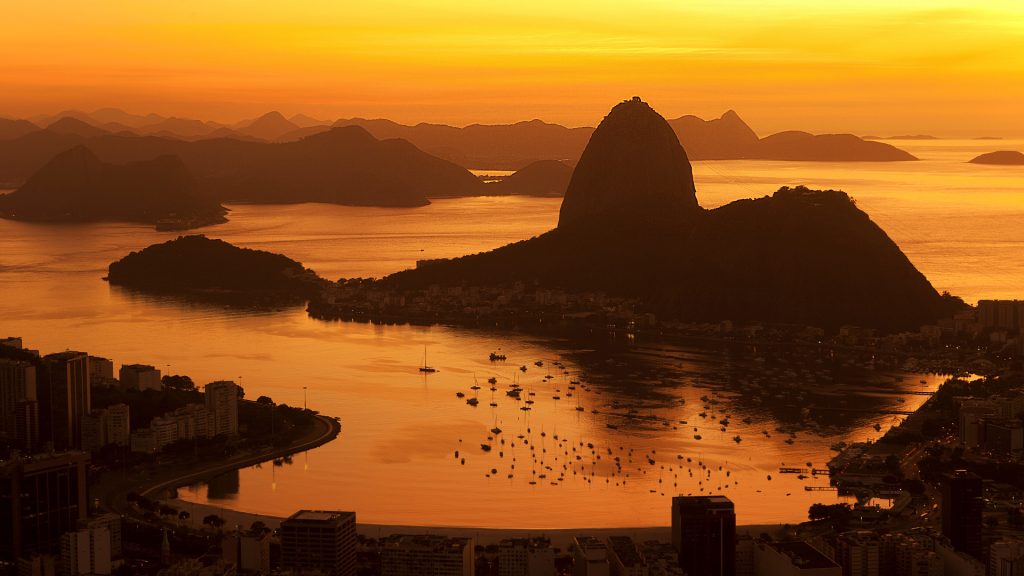 Sunrise at the coastline of Rio de Janeiro with Sugarloaf mountain, Guanabara Bay, Brazil