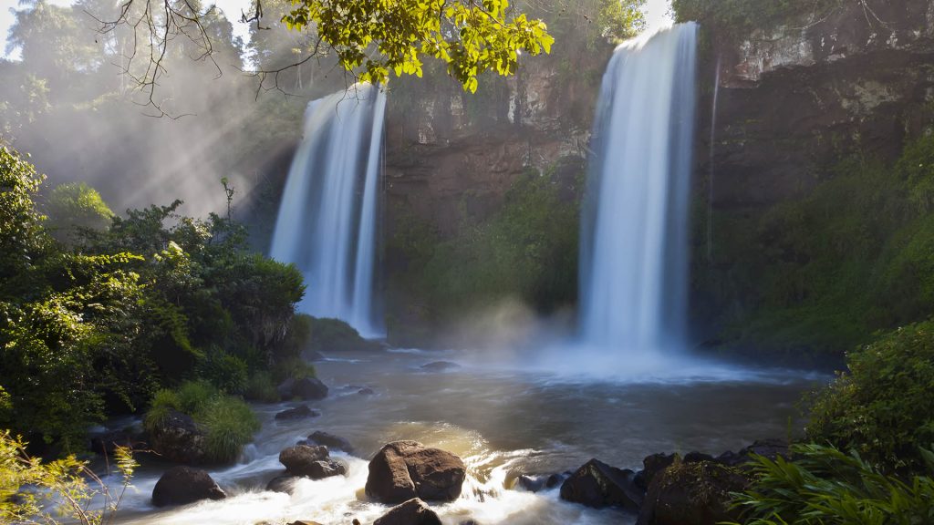 Cascading waterfalls flowing into a pond, Iguazú Falls National Park, Argentina