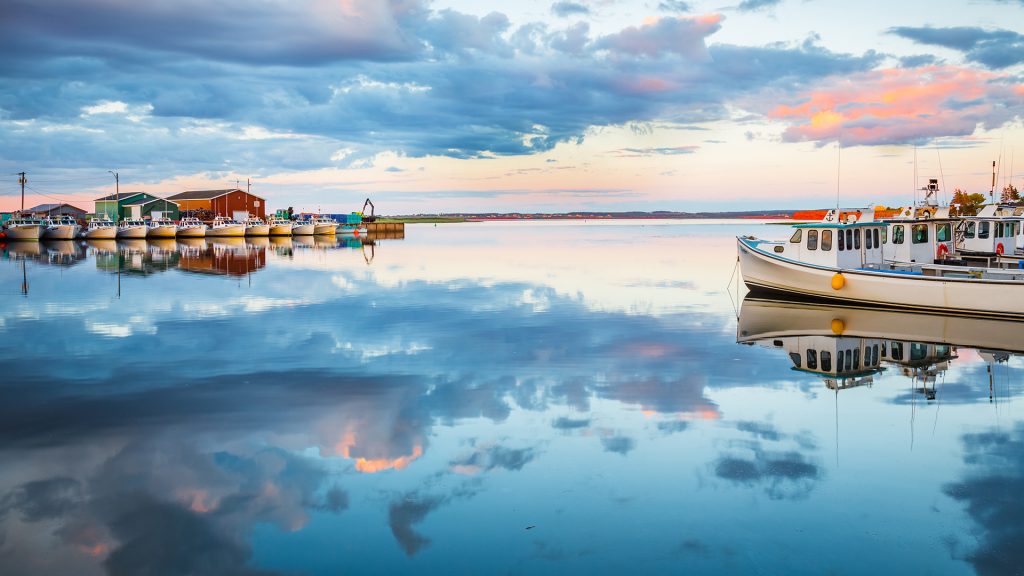 Calm water in Malpeque Bay Harbor at sunset, Prince Edward Island, Maritimes, Canada