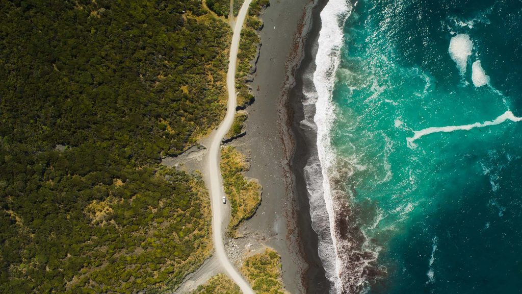 Road passing next to coast, Pūtangirua Pinnacles Reserve, Wellington Region, New Zealand