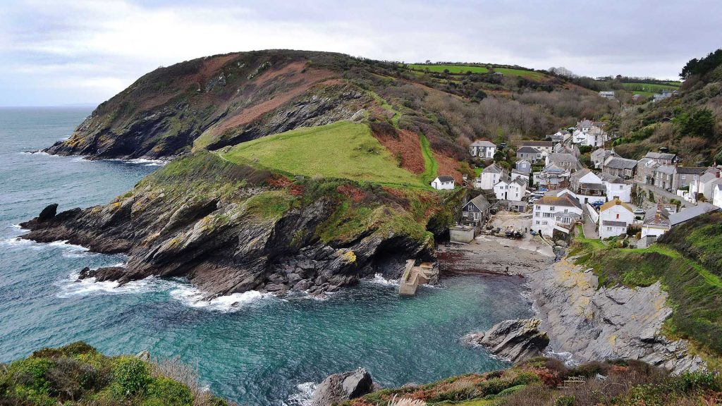 View of small Cornish seaside village of Portloe and its harbour ...