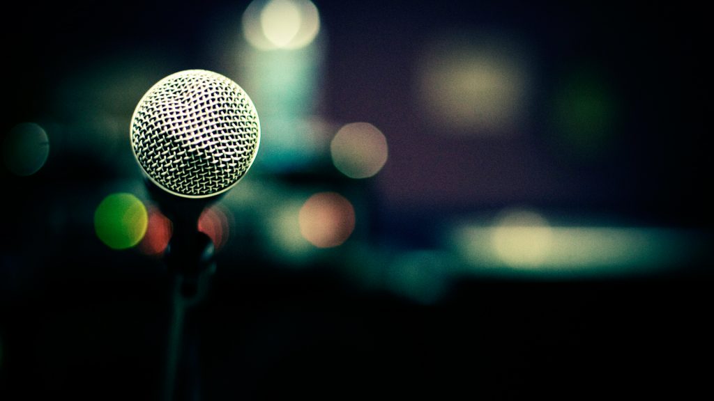 Microphone photographed from the view of a stage with very shallow depth of field, Norway