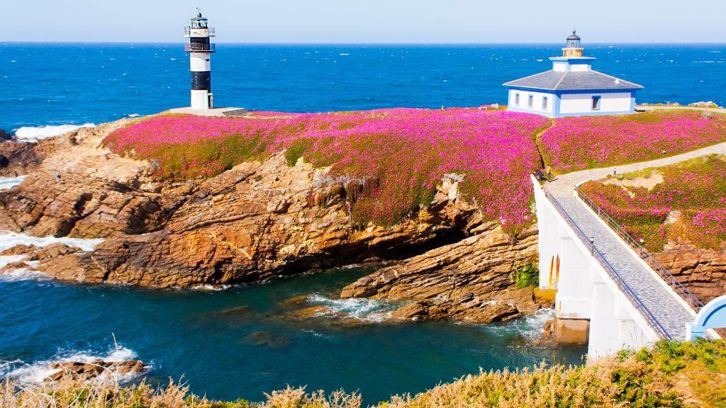 Pancha island lighthouse, bridge and seascape in Ribadeo, A Mariña area, Lugo, Galicia, Spain