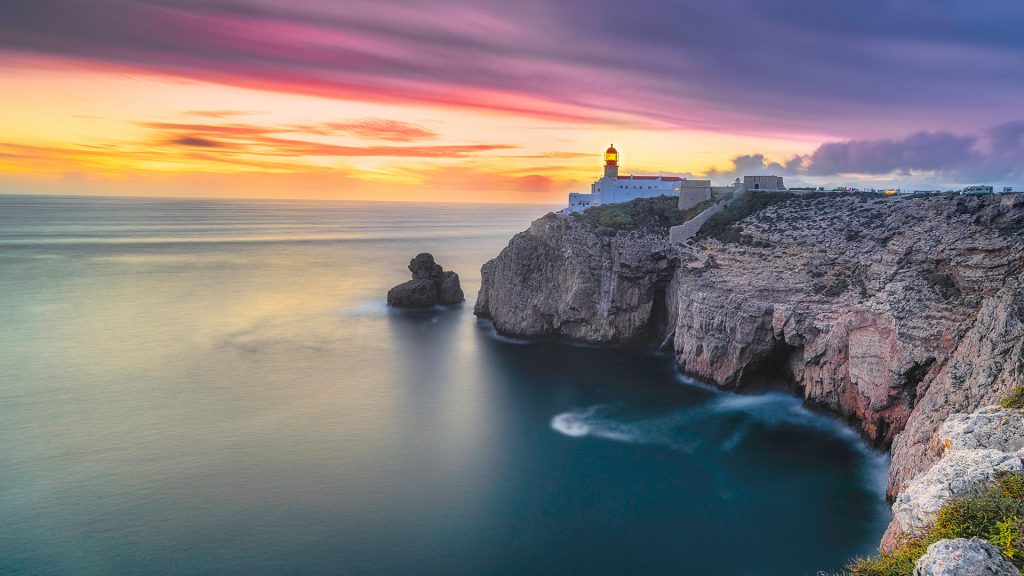 Cliff with Lighthouse of Cabo de São Vicente at sunset, Sagres, Portugal