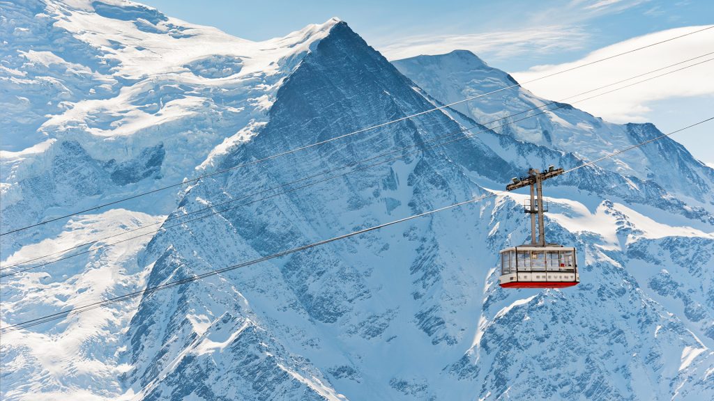 Brévent cable car passing landscape of Mont Blanc, Chamonix, France