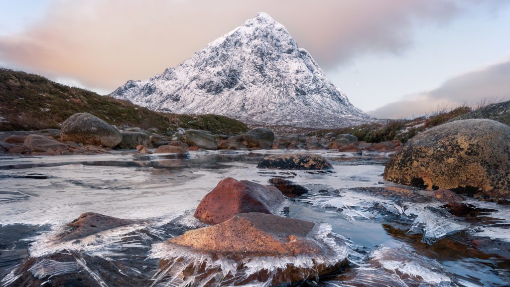 View of snowcapped mountains against sky in winter, Glencoe, Ballachulish, Scotland, UK