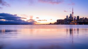 Colorful winter sunset over calm Lake Ontario water with city skyline, Toronto, Canada 7181403a2aef74ce1343577012c707f4