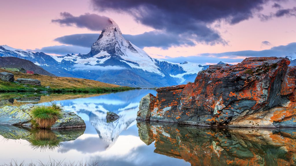 Sunrise with Matterhorn mountain peak and Stellisee alpine lake, Zermatt, Valais, Switzerland