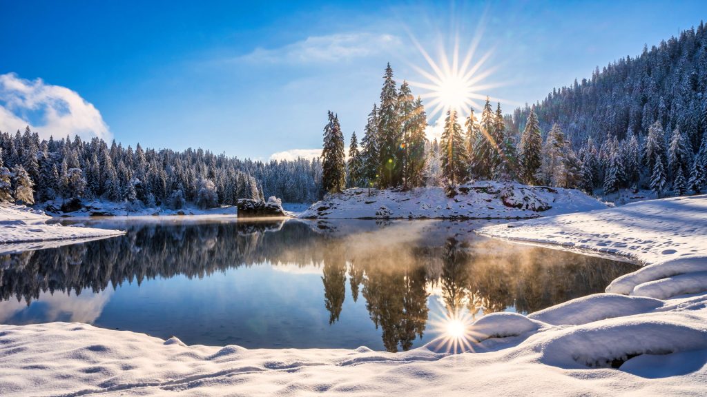 Caumasee lake in winter at sunrise, Graubünden region, Switzerland Caumasee lake in winter at sunrise, Graubünden region, Switzerland
